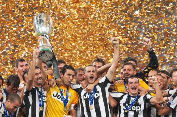 Juventus players celebrate their win aga